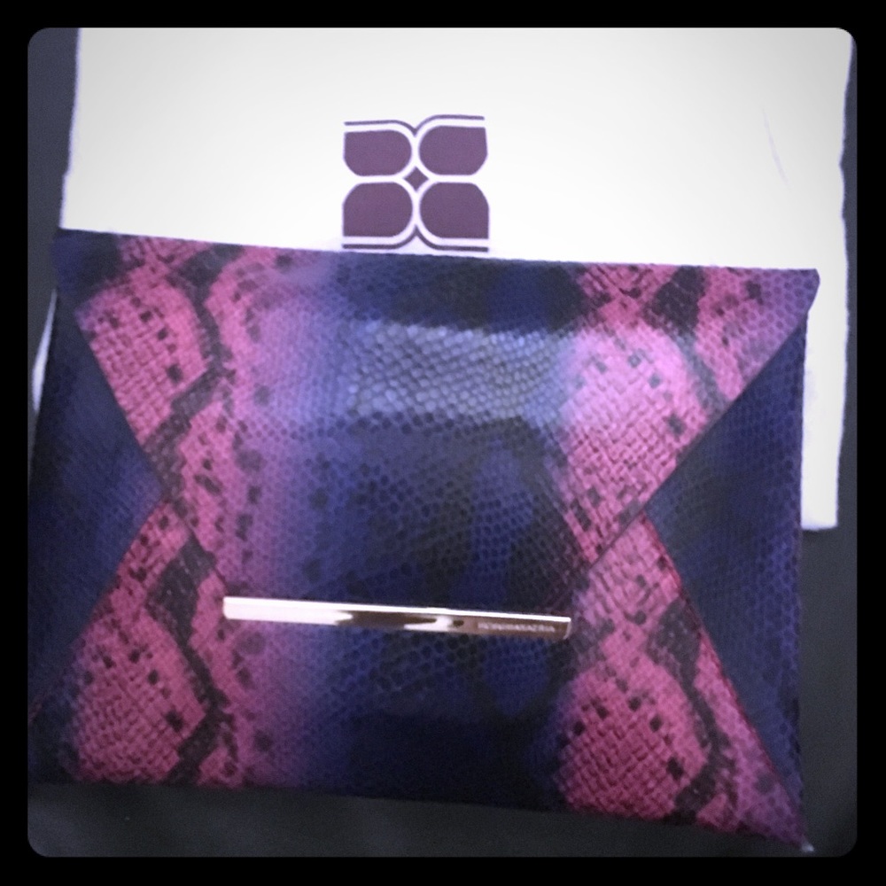 NWT BCBG leather clutch, excellent condition